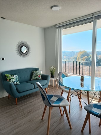 Deluxe Apartment | Living area | 40-inch LED TV with digital channels, TV, Netflix