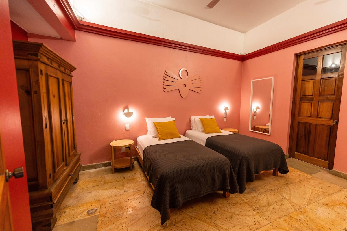 Habitación superior con 2 camas individuales | Ropa de cama