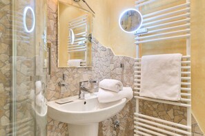 Shower, free toiletries, hair dryer, towels