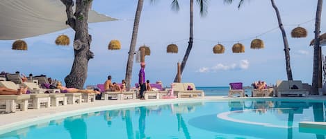 Outdoor pool, open 9:00 AM to 7:00 PM, pool umbrellas, sun loungers