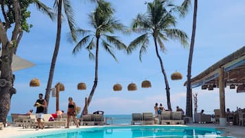 Outdoor pool, open 9:00 AM to 7:00 PM, pool umbrellas, sun loungers