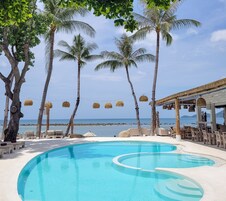 Outdoor pool, open 9:00 AM to 7:00 PM, pool umbrellas, sun loungers