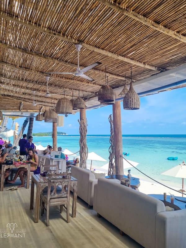 On the beach, sun loungers, beach umbrellas, beach towels