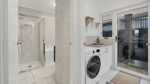 Shower, hair dryer, towels