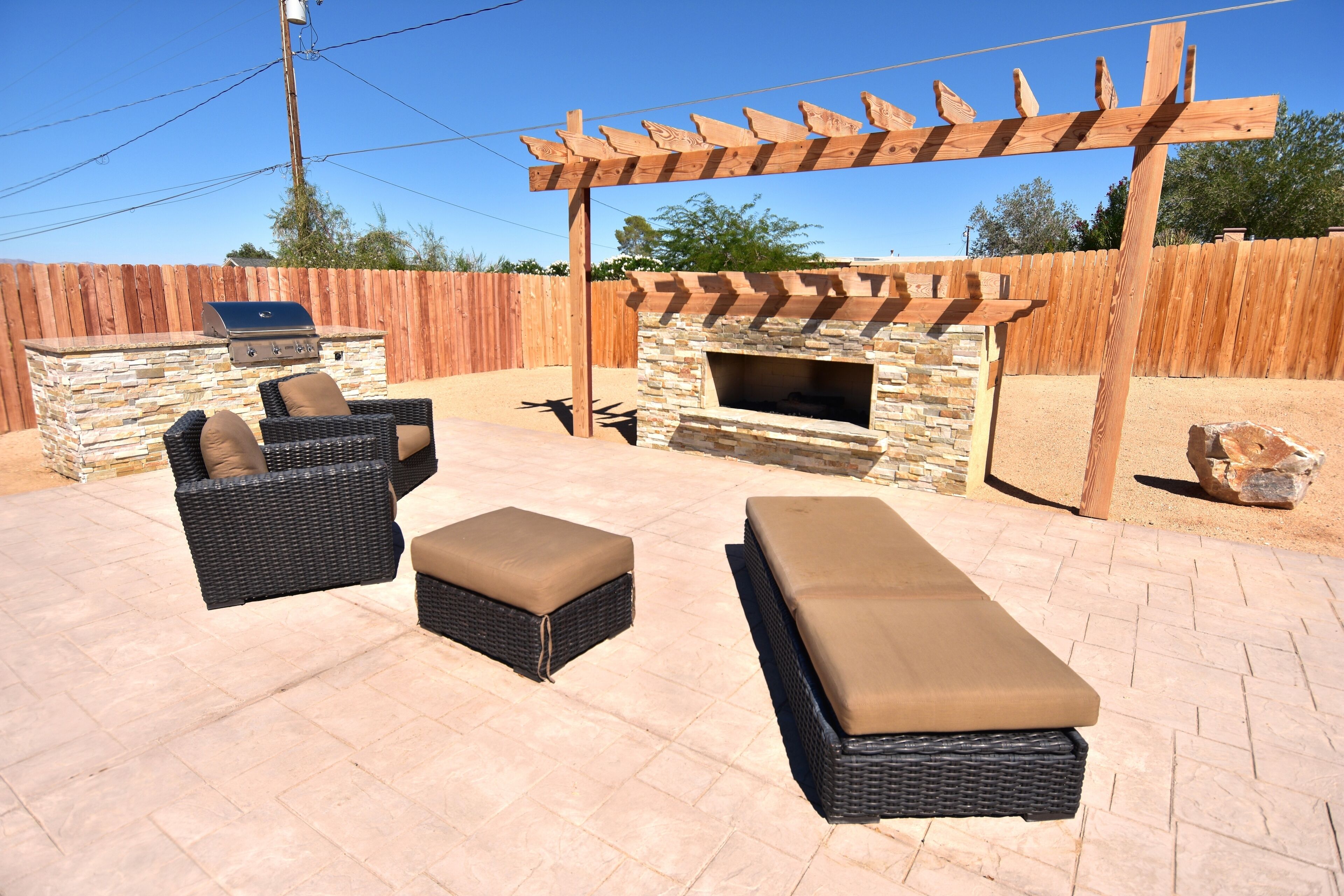 Joshua Tree Starlight Retreat with outdoor fireplace.