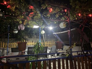 Standard Apartment, 1 Bedroom, Garden View | Living area | Plasma TV, fireplace, DVD player, MP3 dock