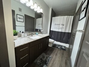 Hair dryer, towels, soap, shampoo