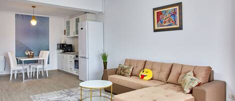 Deluxe Apartment | Living area | Smart TV