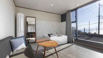 Deluxe Room - Room 101, Room 102 randomly assigned (spa bath available once a day) | 1 bedroom, free WiFi