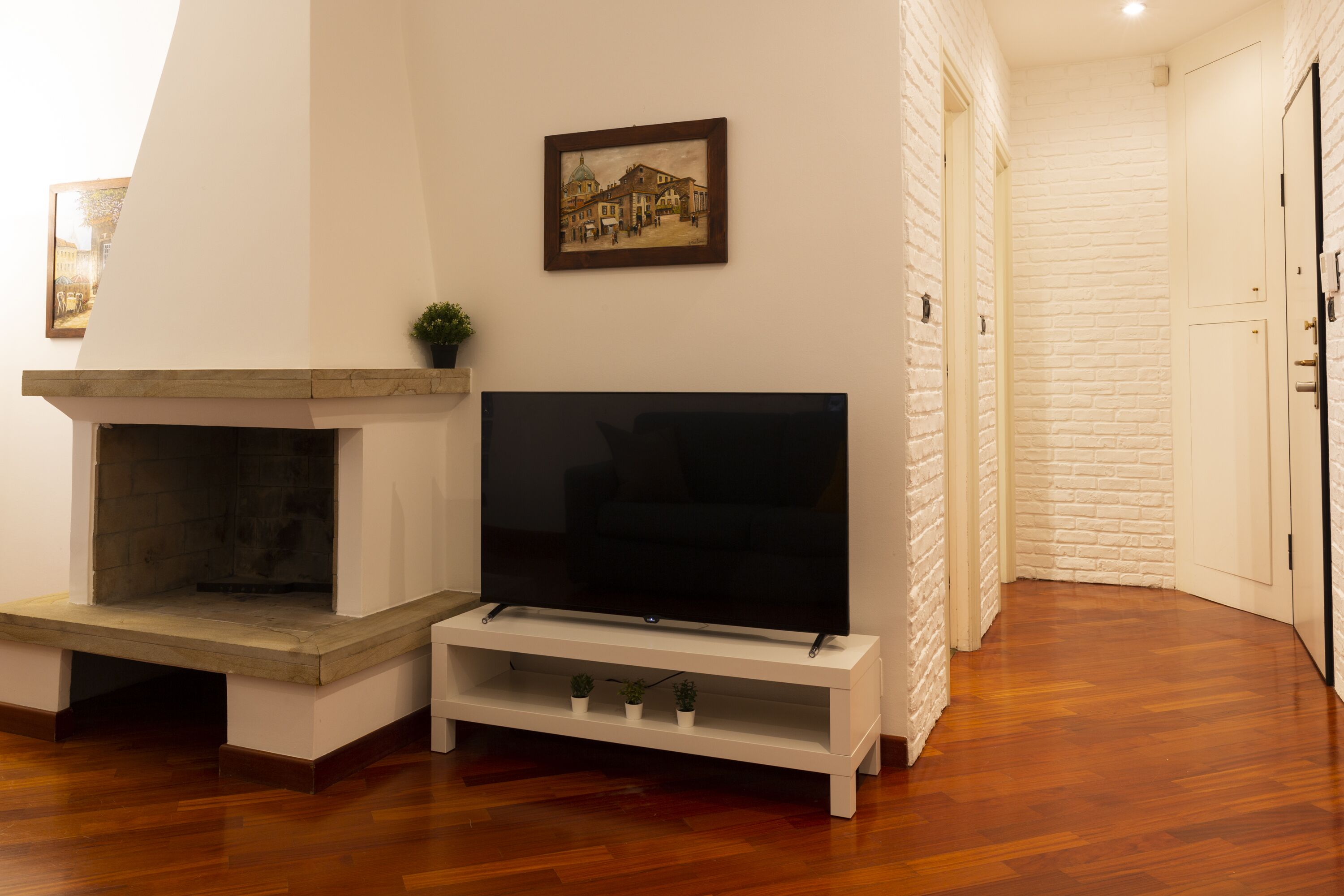 Deluxe Apartment | Living area | 49-inch flat-screen TV with digital channels, TV