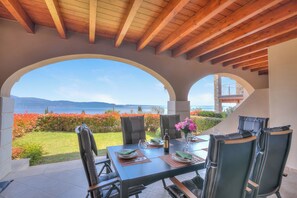 Family Apartment, Multiple Bedrooms, 2 Bathrooms, Mountainside (Borgo Belvedere-lake view & shared) | Outdoor dining - Borgo Belvedere-lake View & Shared Pool (Toscolano Maderno)