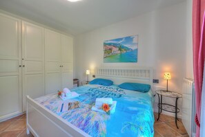 Perhehuoneisto, useita makuuhuoneita, 2 kylpyhuonetta (Borgo Belvedere-lake view & shared) | 2 makuuhuonetta, silitysrauta/-lauta, Wi-Fi, vuodevaatteet