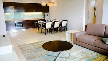 Premier Room, 2 Bedrooms, Non Smoking, Refrigerator & Microwave | Living area | 40-inch Smart TV with cable channels, TV