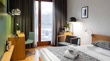 Habitación individual Deluxe | 1 dormitorio, minibar, caja fuerte y escritorio