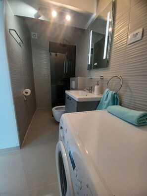 Hair dryer, towels, soap, toilet paper
