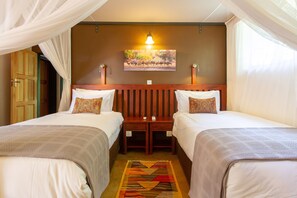 Deluxe Double or Twin Room, 1 Bedroom, Courtyard Area | In-room safe, individually decorated, individually furnished - The Courtney Lodge (Victoria Falls)