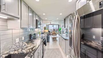 Coffee/tea maker, fridge, microwave, oven