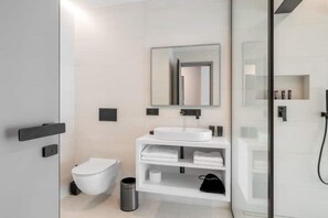 Dusj, håndklær og såpe