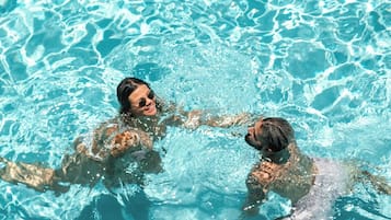 Outdoor pool, pool umbrellas, pool loungers