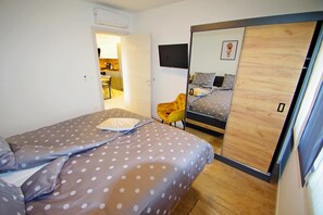 2 habitaciones, tabla de planchar con plancha y wifi gratis 