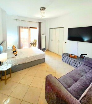 Apartamento, 1 cama Queen e sofá-cama | 1 quarto, Wi-Fi de cortesia, roupa de cama