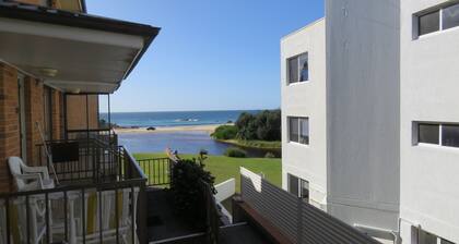 A light and airy 2 bedroom beachfront unit with views of Trial Bay from the balcony.
