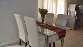 Comfort Tulip Apartment | Living area | 20-cm flat-screen TV with cable channels, Netflix, streaming services