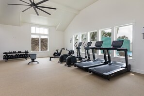 A gym with treadmills, dumbbells, and an elliptical machine. - Resort Pools, Pet Friendly, Boardwalk to Beach (Port Aransas)