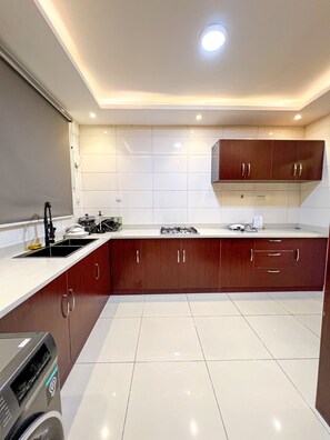 High chair, eco-friendly cleaning products, paper towels - Maison Luxury Apartments (Lekki)