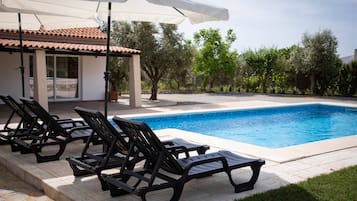 Outdoor pool, pool umbrellas, pool loungers