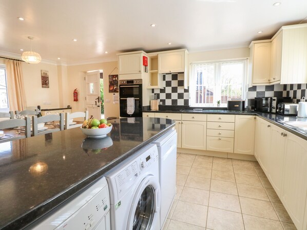Fridge, dishwasher, cookware/dishes/utensils