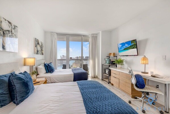 Desk, iron/ironing board, travel crib, WiFi