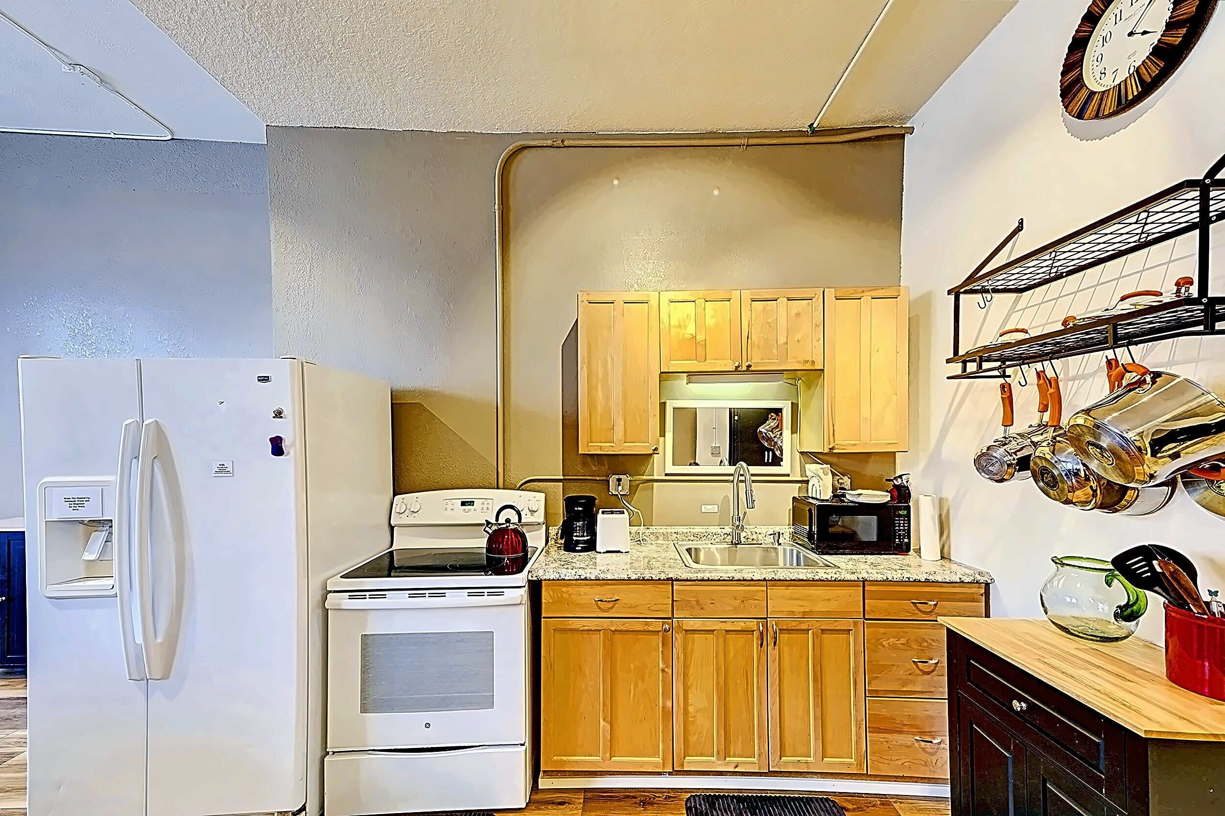 Fridge, microwave, stovetop, coffee/tea maker