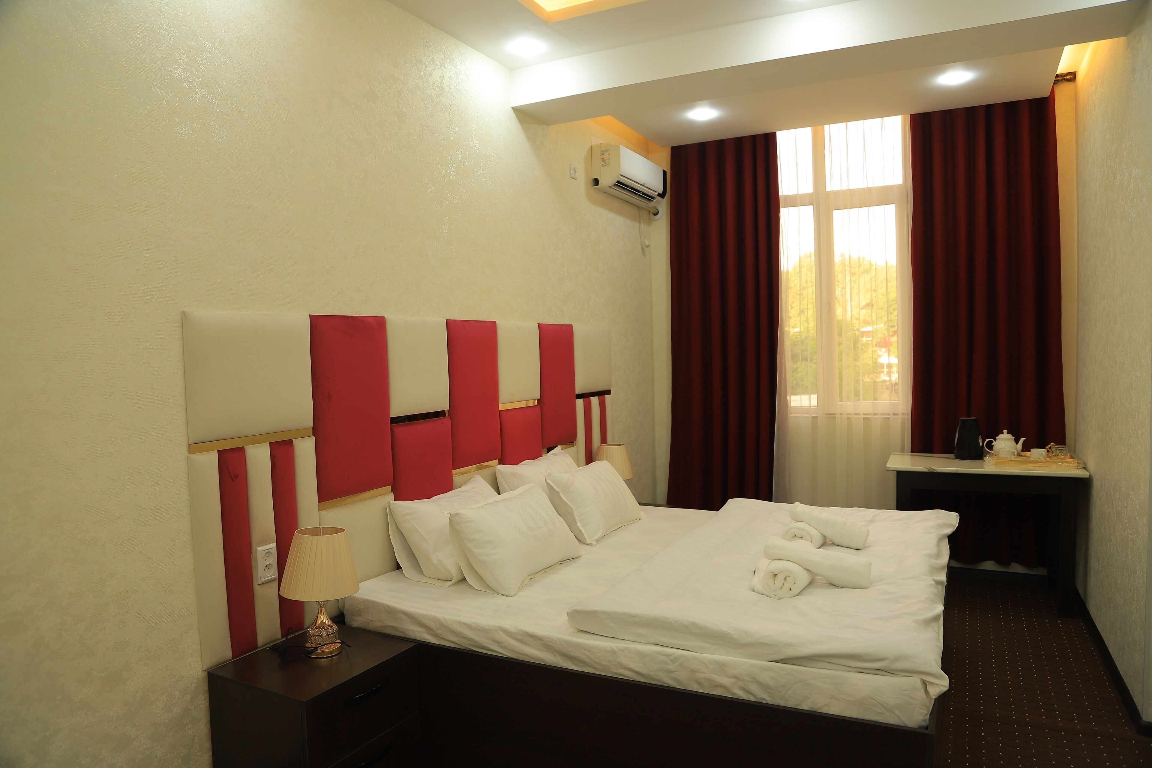 room | pillow-top beds, desk, blackout curtains, soundproofing