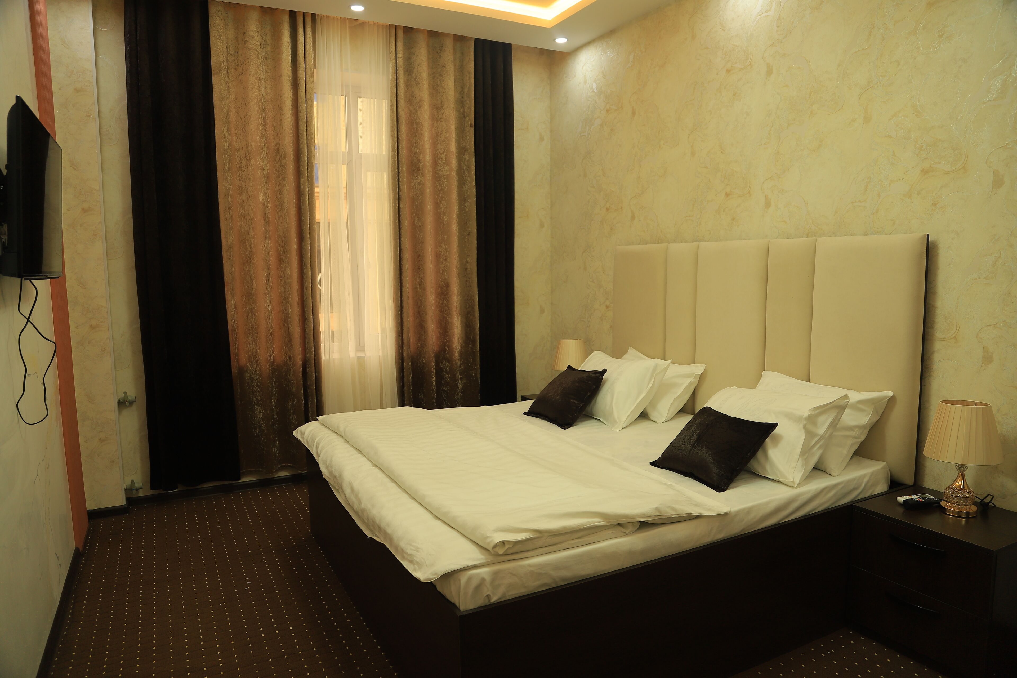 pillow-top beds, desk, blackout curtains, soundproofing