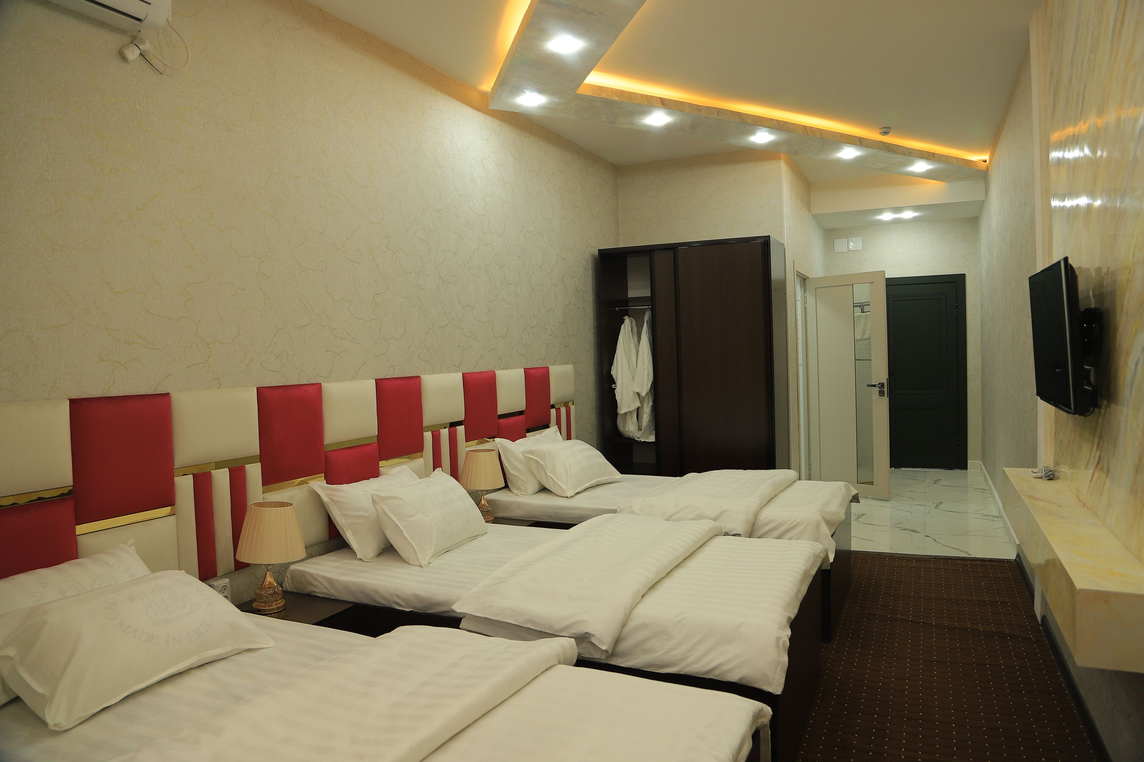 room | pillow-top beds, desk, blackout curtains, soundproofing