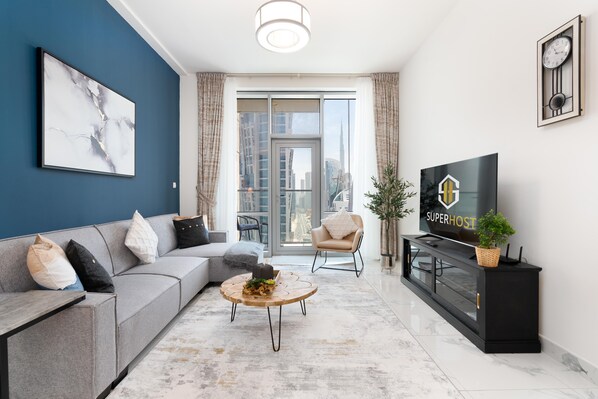 Design Apartment | Living area | 58-inch Smart TV with cable channels, TV, Netflix