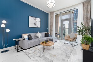 Living area - SuperHost - Luxury Apt with Panoramic Burj and Canal Views (Dubai)