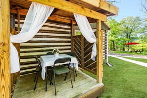 Outdoor dining - Modernized Log Cabin w Hot Tub, Fire Pit & Views! (Berkeley Springs)