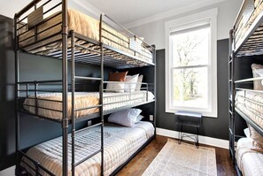 4 bedrooms, desk, iron/ironing board, travel cot