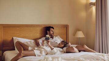 Premium bedding, pillowtop beds, minibar, in-room safe