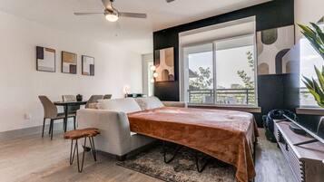 1 bedroom, desk, iron/ironing board, travel crib