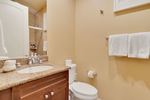 Bathtub, hair dryer, towels