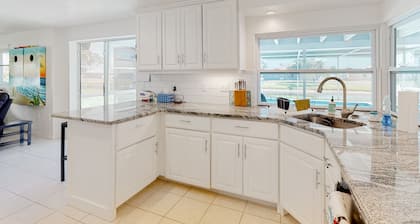 Bright Florida home with pool, gas grill, private pool, and washer/dryer