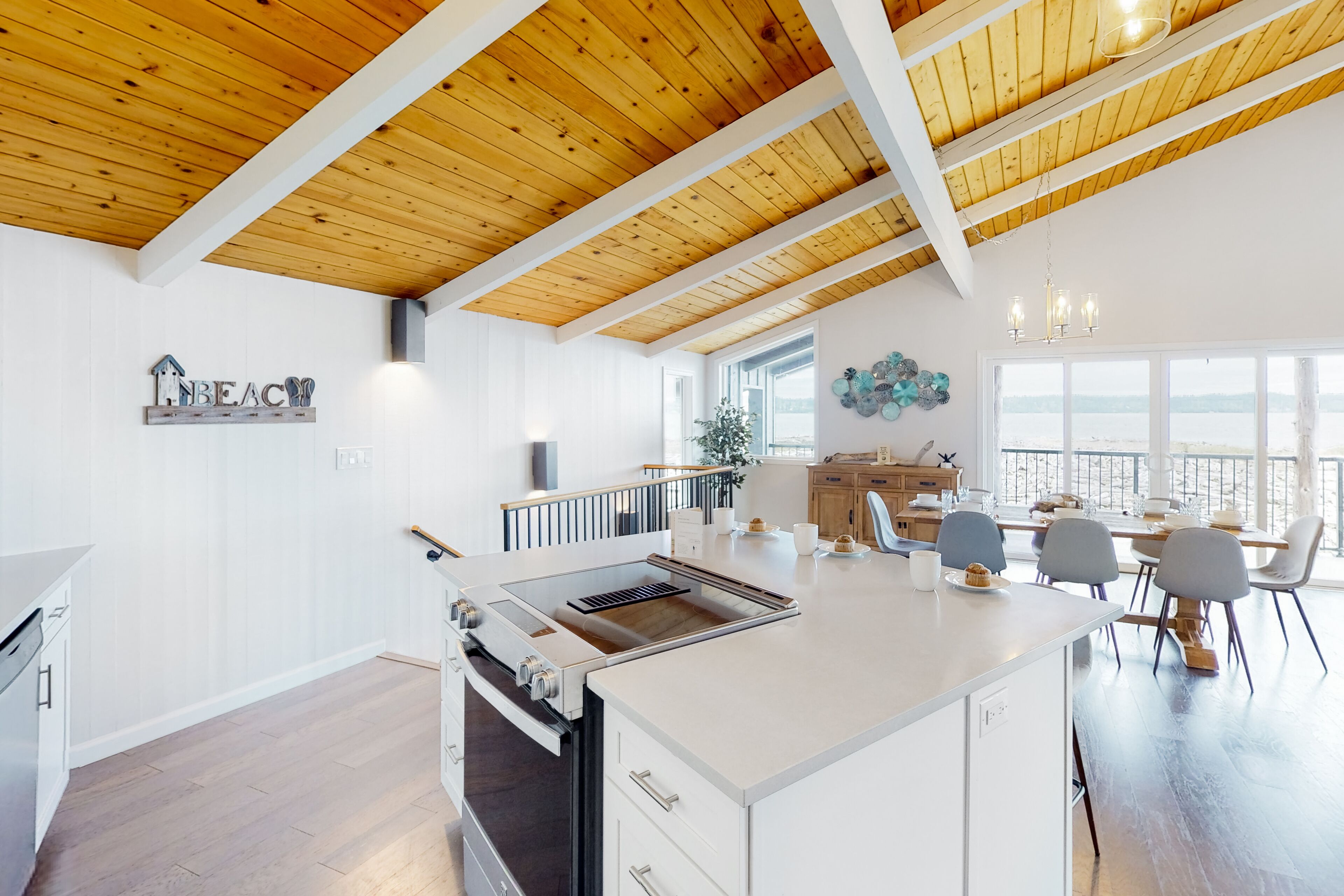 Inviting waterfront home with firepit, pool table, grill, & W/D