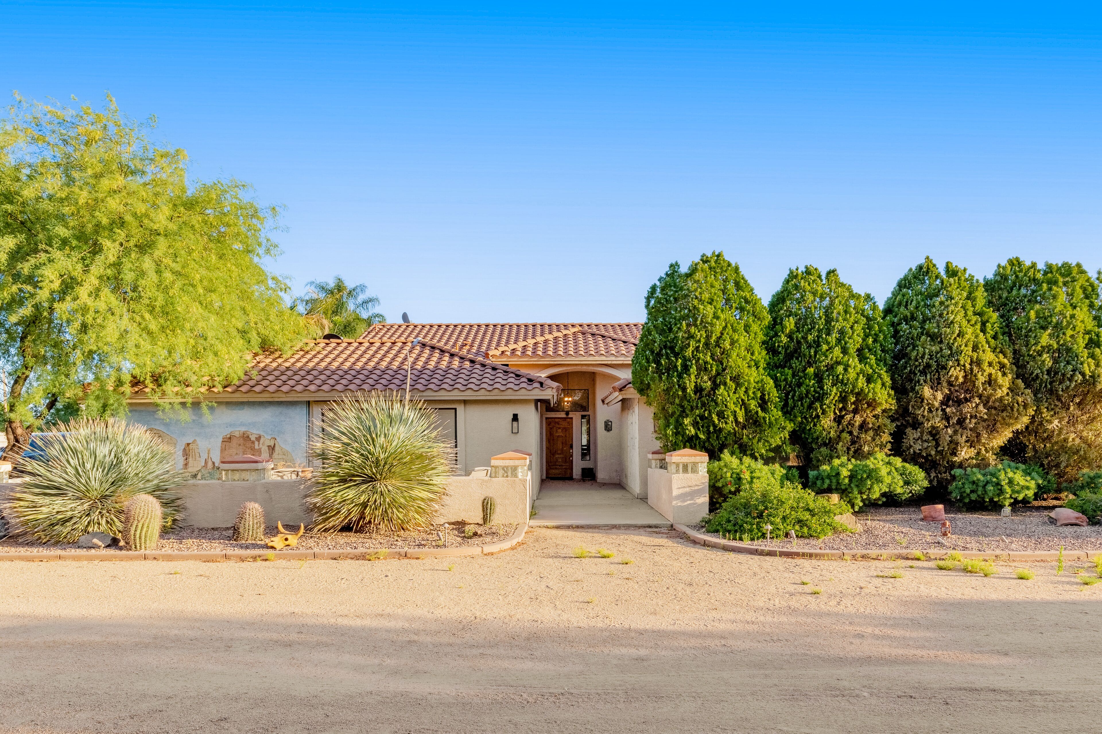 Gated home + casita with pool, spa, patio, outdoor kitchen, & exercise room