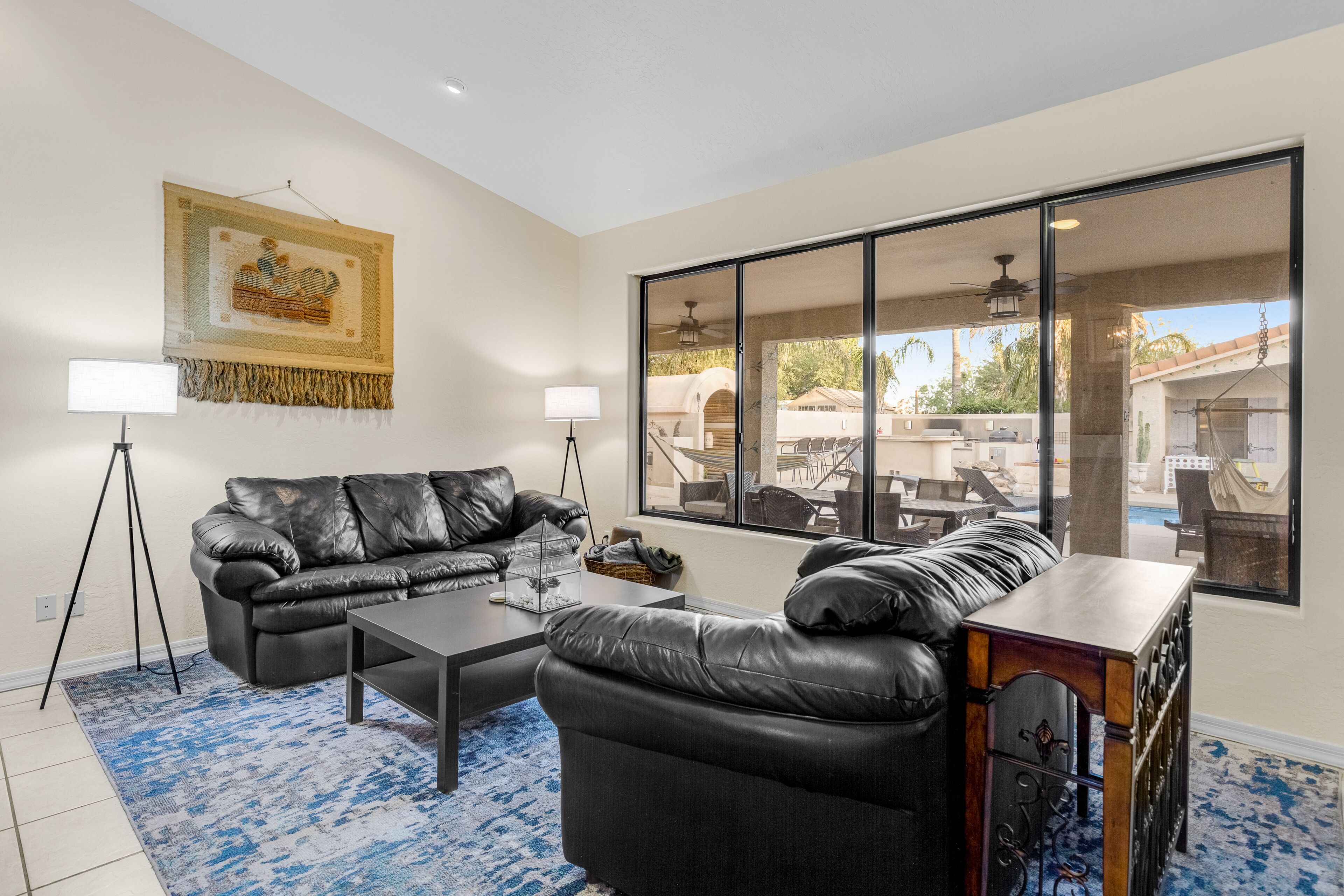 Gated home + casita with pool, spa, patio, outdoor kitchen, & exercise room