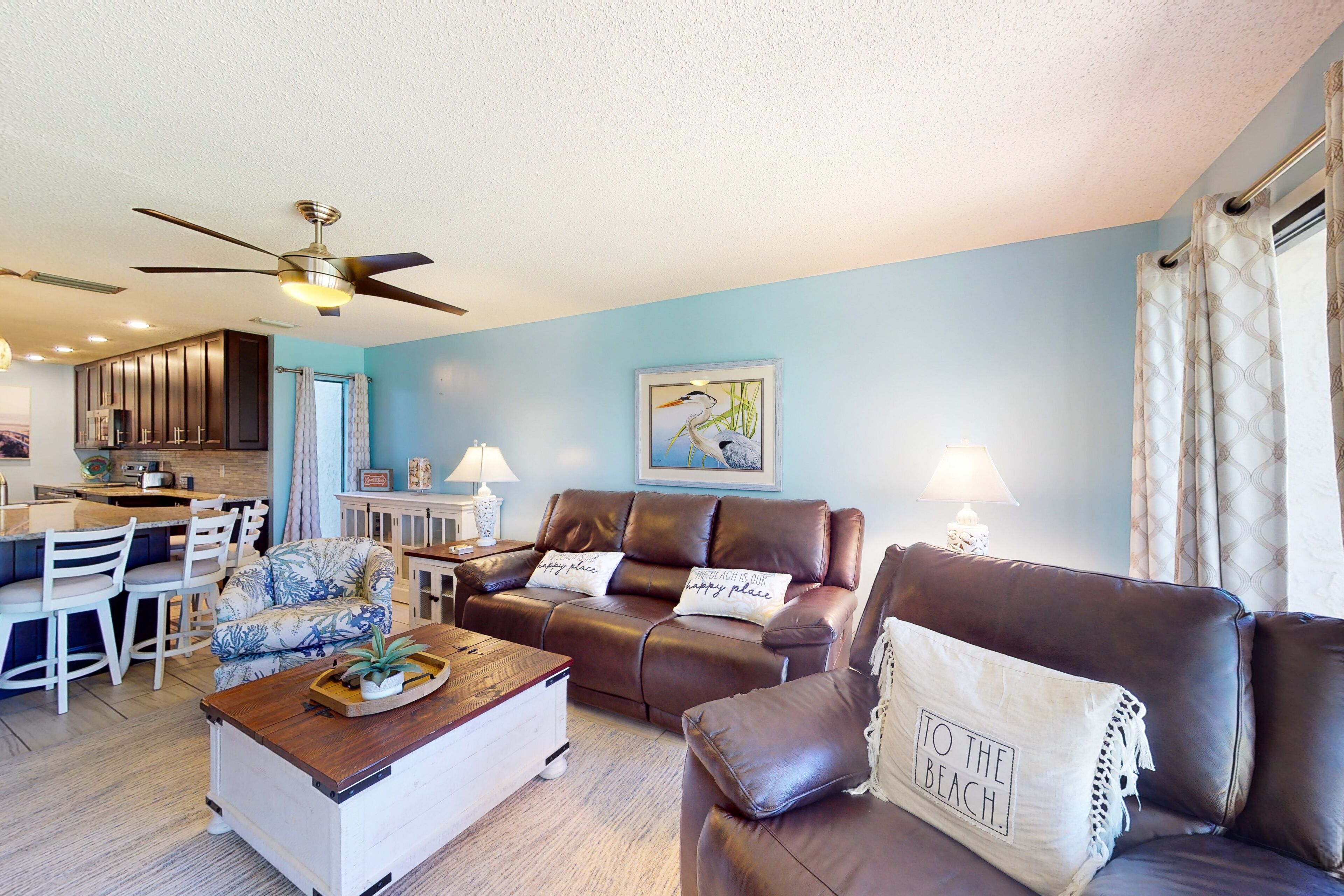 Greenside condo with on-site golf, tennis, pools, & private beach access