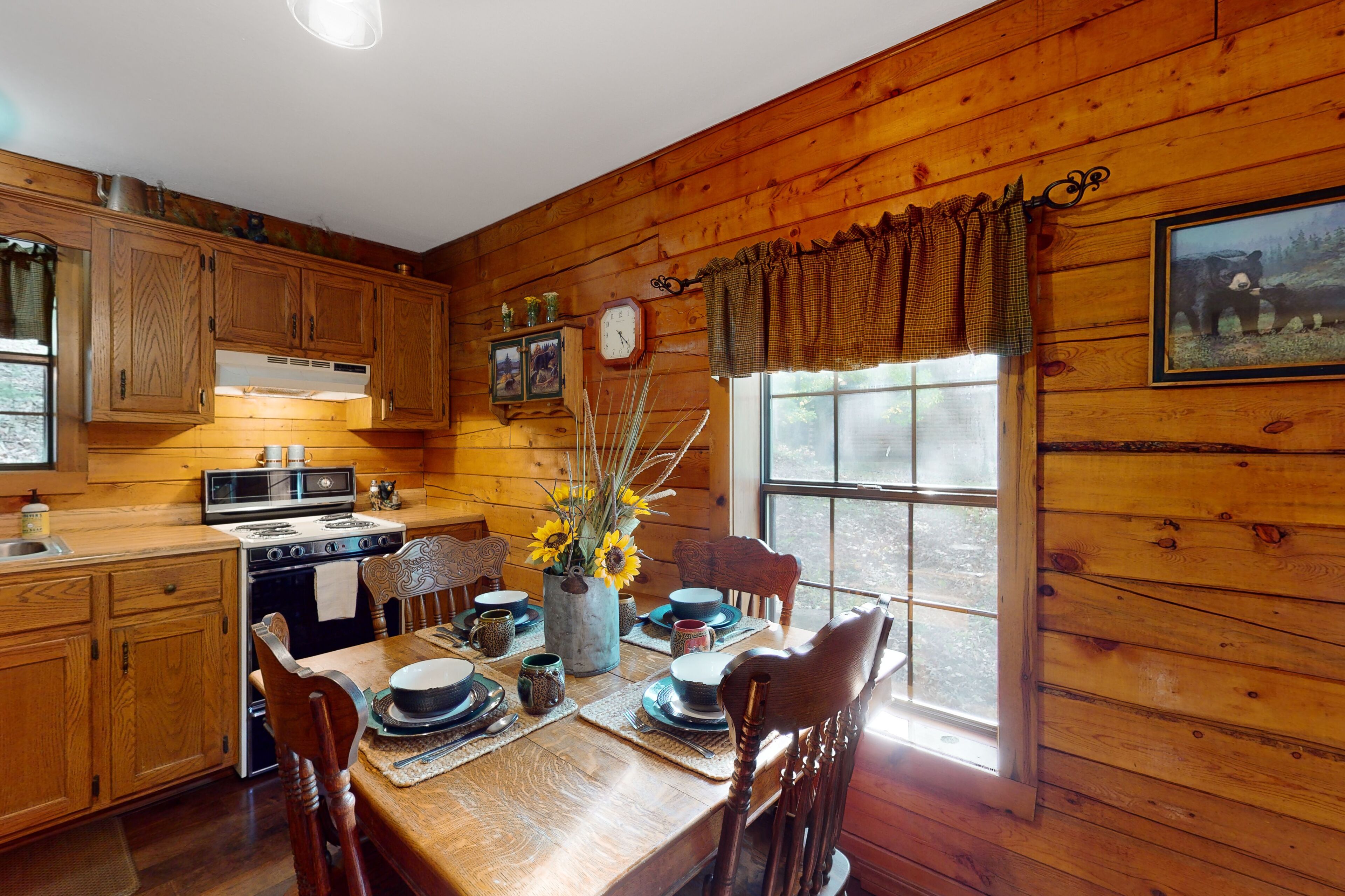 Dog-friendly cabin with private porch, fireplace, & on-site fishing pond