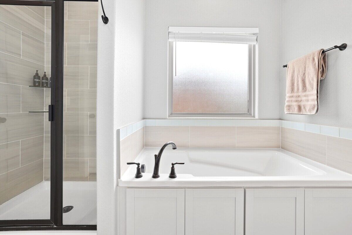 Bathtub, hair dryer, towels